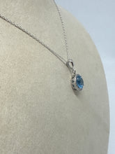 Load image into Gallery viewer, 14K White Gold Round Blue Topaz and Diamond Pendant Necklace