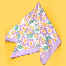 Load image into Gallery viewer, Floral patterned fabric with purple border on a yellow background