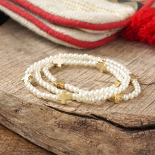 Load image into Gallery viewer, Mini Sideways Cross Bracelet stack with Gold Metal and Pearl Beads
