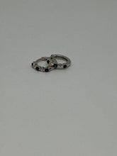 Load image into Gallery viewer, 14K White Gold Diamond and Blue Sapphire Huggie Hoop Earring
