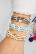 Load image into Gallery viewer, Mini Sideways Cross Bracelet stack with Glass and Gold metal Beads
