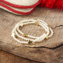 Load image into Gallery viewer, Mini Sideways Cross Bracelet stack with Gold Metal and Pearl Beads
